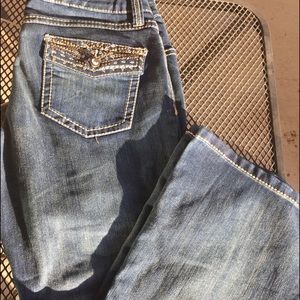 inc curvy fit boot leg jeans